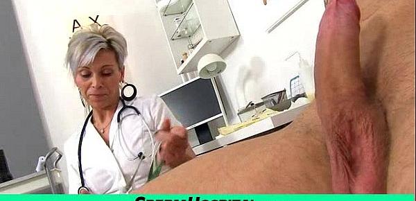  Sexy uniform milf Beate milking young male patient